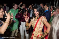 Adorable indian bride showing some dance moves. Adorable indian bride showing some dance moves.