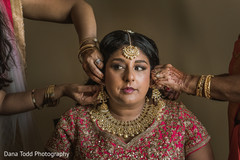 Indian bride being assisted by special guests. Indian bride being assisted by special guests.