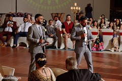 Indian groomsmen giving a speech during reception. Indian groomsmen giving a speech during reception.