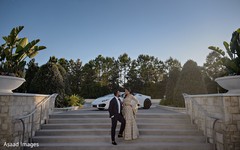 Indian couple in front of an elegant car. Indian couple in front of an elegant car.