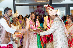 Maharani putting her red marked hands on paper ritual. Maharani putting her red marked hands on paper ritual.
