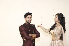 Indian bride and groom during pictures. Indian bride and groom during pictures.