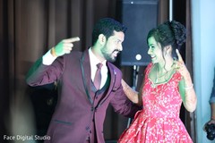 Bride and groom having an amazing time dancing. Bride and groom having an amazing time dancing.