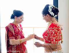 Indian bride putting on her bangles. Indian bride putting on her bangles.