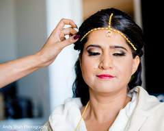 Indian bride getting her matha patti on. Indian bride getting her matha patti on.