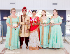 Marvelous Indian lovebirds portrait with bridesmaids. Marvelous Indian lovebirds portrait with bridesmaids.