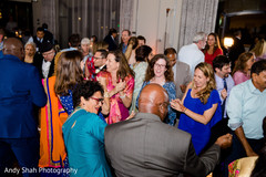 Joyful indian wedding guests reception dance. Joyful indian wedding guests reception dance.