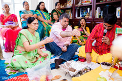 Indian family during haldi ritual. Indian family during haldi ritual.