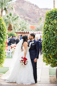Lovely kiss capture of Indian bride and groom Lovely kiss capture of Indian bride and groom