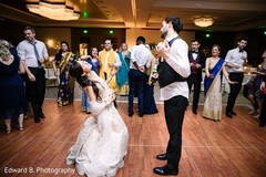 Joyful indian bride and groom dancing Joyful indian bride and groom dancing
