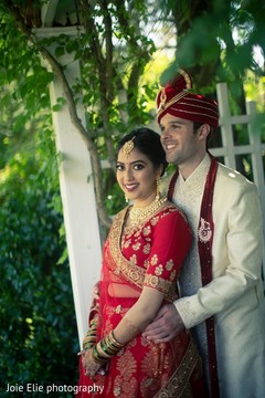 Indian bride and Raja posing for pictures. Indian bride and Raja posing for pictures.