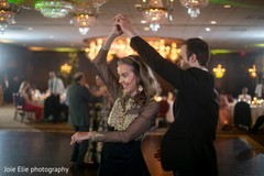 Groom dancing with his mother and both looking dazzling. Groom dancing with his mother and both looking dazzling.