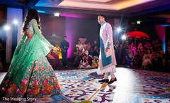 Cheerful Indian couple at sangeet dance. Cheerful Indian couple at sangeet dance.
