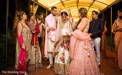 Indian bride throwing rice on her back ritual, Indian bride throwing rice on her back ritual,
