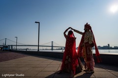 Indian bride and groom's romantic first look moment Indian bride and groom's romantic first look moment