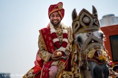 Elegant Indian groom riding baraat white horse Elegant Indian groom riding baraat white horse
