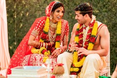 Joyful Indian couple at ceremony capture. Joyful Indian couple at ceremony capture.