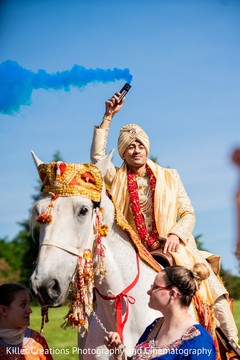 Elegant Indian groom riding baraat white horse. Elegant Indian groom riding baraat white horse.