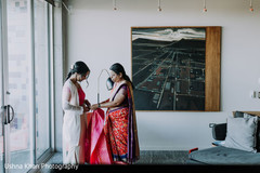 Bride being assisted by a special family guest. Bride being assisted by a special family guest.