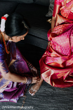 Maharani being assisted by family. Maharani being assisted by family.