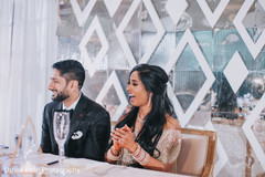 Indian bride and groom reacting to speeches. Indian bride and groom reacting to speeches.