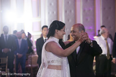 Lovely indian bride dancing with her father Lovely indian bride dancing with her father