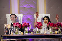 Joyful Indian bride and groom at their reception party Joyful Indian bride and groom at their reception party