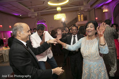 Indian bride's parents dancing Indian bride's parents dancing