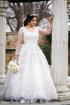 Stunning Maharani in white wedding dress. Stunning Maharani in white wedding dress.