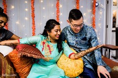 Indian bride showing mehndi art Indian bride showing mehndi art