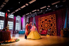 Joyful sangeet bride and groom dancing photography Joyful sangeet bride and groom dancing photography