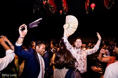 Joyful Indian wedding guests dancing capture Joyful Indian wedding guests dancing capture