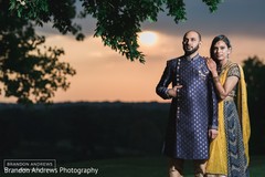 Enchanting Indian couple with a beautiful landscape. Enchanting Indian couple with a beautiful landscape.