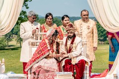 Indian couple holding hands in their ceremony. Indian couple holding hands in their ceremony.