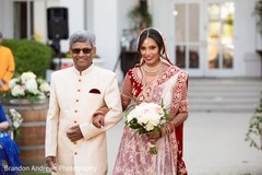 Beautiful Indian bride escorted by her father. Beautiful Indian bride escorted by her father.