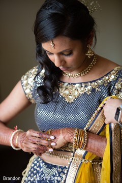 Gorgeous Maharani putting bracelets on. Gorgeous Maharani putting bracelets on.