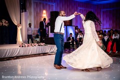 Lovely Indian couple dancing at reception party. Lovely Indian couple dancing at reception party.