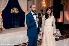 Indian groom giving reception speech with his Maharani. Indian groom giving reception speech with his Maharani.