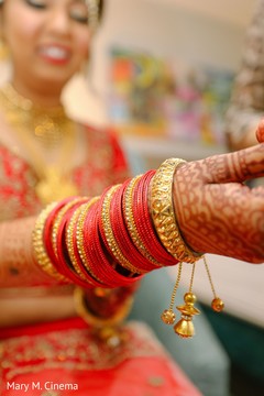 Incredible Indian bridal's golden and red bangles Incredible Indian bridal's golden and red bangles