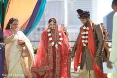 Indian couple holding during wedding ceremony ritual Indian couple holding during wedding ceremony ritual