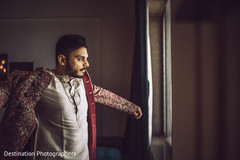 Charming Indian groom getting ready scene. Charming Indian groom getting ready scene.