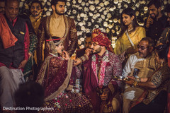 Lovely Indian couple sharing food during wedding ceremony. Lovely Indian couple sharing food during wedding ceremony.