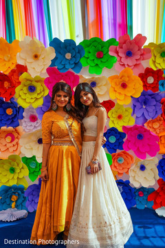 Sweet Indian bride posing with bridesmaid. Sweet Indian bride posing with bridesmaid.