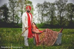 Indian groom and bride posing for pictures. Indian groom and bride posing for pictures.