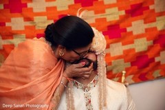 Groom and his mother during the rituals. Groom and his mother during the rituals.