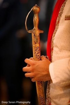 Raja holding the kirpan. Raja holding the kirpan.