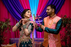 Marvelous capture of Indian couple holding dandiya sticks. Marvelous capture of Indian couple holding dandiya sticks.