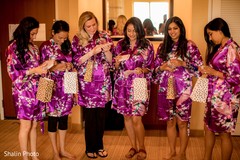 Lovely Indian bridesmaids getting their gifts. Lovely Indian bridesmaids getting their gifts.