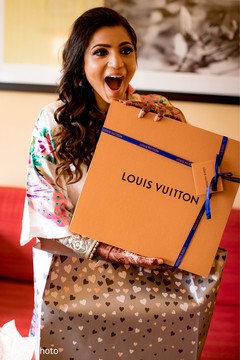 Enchanting Indian bride getting a gift. Enchanting Indian bride getting a gift.