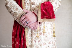 Close up capture of Indian grooms sherwani and dupatta. Close up capture of Indian grooms sherwani and dupatta.